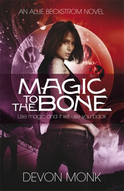 Book cover of: Magic to the Bone. By: Devon Monk