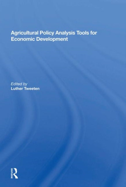 Book cover of: Agricultural Policy Analysis Tools For Economic Development. By: Luther G. Tweeten
