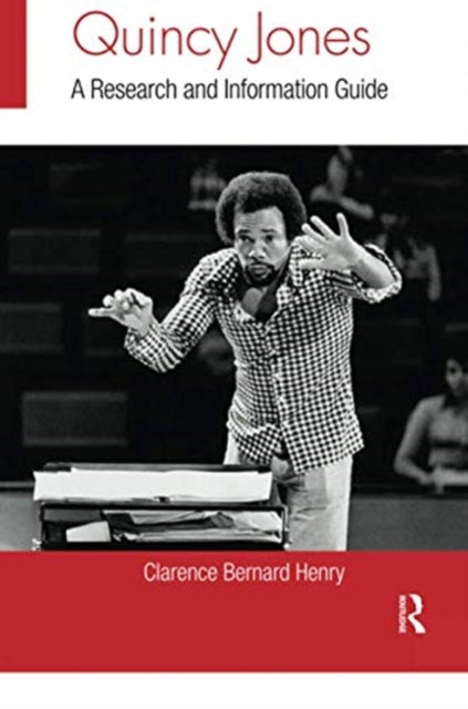Book cover of: Quincy Jones. By: Clarence Bernard Henry