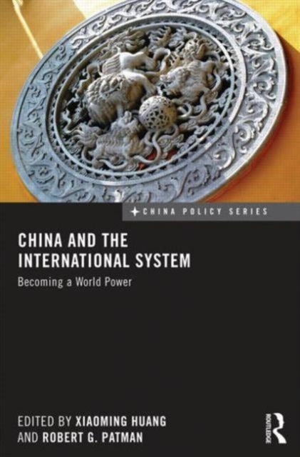 Book cover of: China and the International System. By: Xiaoming Huang