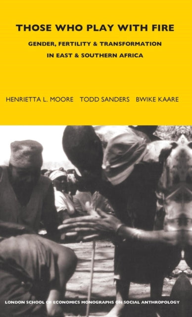 Book cover of: Those Who Play With Fire. By: Henrietta L. Moore