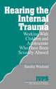 Book cover of: Hearing the Internal Trauma. By: Sandra Wieland