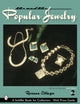 Book cover of: Forties & Fifties Popular Jewelry. By: Roseann Ettinger