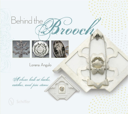 Book cover of: Behind the Brooch. By: Lorena Angulo