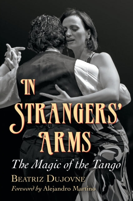 Book cover of: In Strangers' Arms. By: Beatriz E. Dujovne