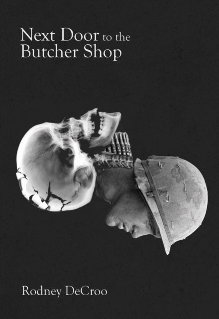 Book cover of: Next Door to the Butcher Shop. By: Rodney DeCroo