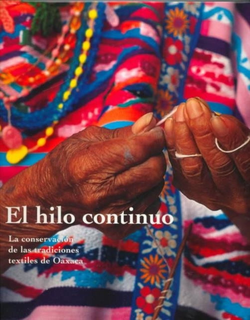 Book cover of: El Hilo Continuo - La Conservacion de Las Tradiciones Textiles de Oaxaca. By: Kathryn Klein