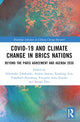 Book cover of: COVID-19 and Climate Change in BRICS Nations. By: Ndivhuho Tshikovhi