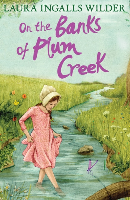 Book cover of: On the Banks of Plum Creek. By: Laura Ingalls Wilder