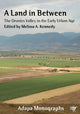 Book cover of: Land in Between. By: Melissa A. Kennedy
