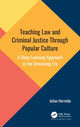 Book cover of: Teaching Law and Criminal Justice Through Popular Culture. By: Julian Hermida