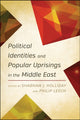 Book cover of: Political Identities and Popular Uprisings in the Middle East. By: Leech Holiiday