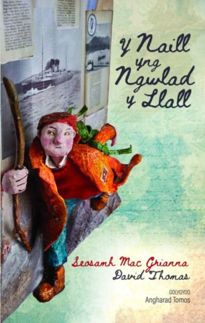 Book cover of: Y Naill yng Ngwlad y Llall - Taith Gwyddel yng Nghymru; Taith Cymry yn Iwerddon. By: Angharad Tomos
