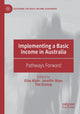 Book cover of: Implementing a Basic Income in Australia. By: Elise Klein