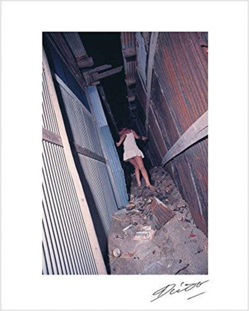 Book cover of: Daido Moriyama in Color: Yokosuka. By: Filippo Maggia